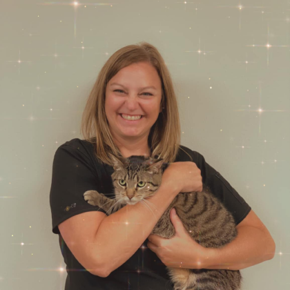Doctor Vicki hugging her furbaby cat